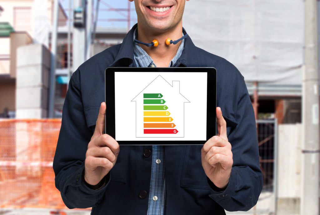 EPC assessor holding an epc rating on an ipad screen