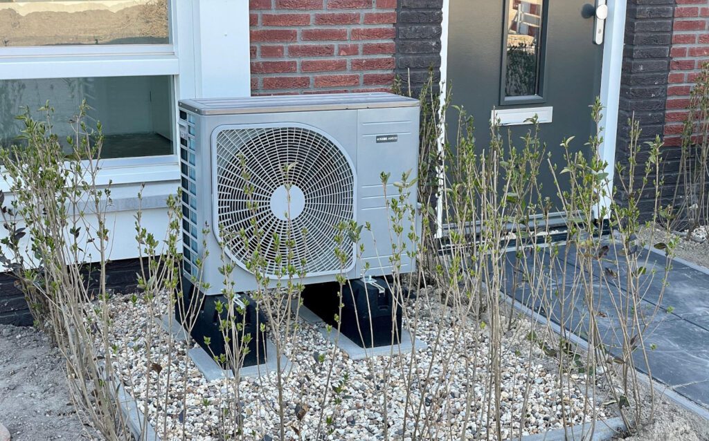 Air source heat pump outside a house — do heat pumps improve EPC rating